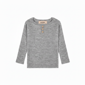 Gray knit sweater with white space