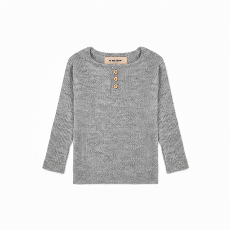Gray knit sweater with white space